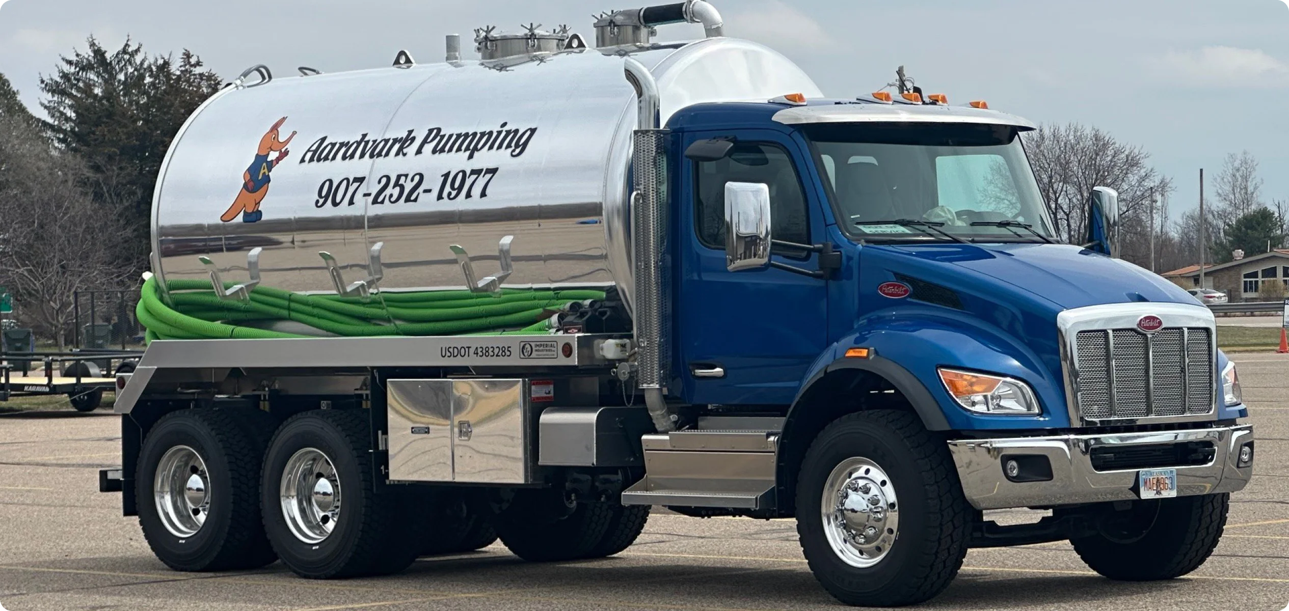 Aardvark Pumping service truck on a Kenai Peninsula property